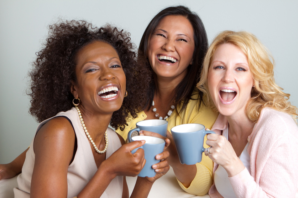 Group of Women Talking and Drinking Coffee